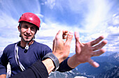 Two male climbers overjoyed at having reached the summit, Dolomites, South Tyrol, Italy