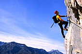 Man on a fixed rope route, Bad Goisern, Salzkammergut, Upper Austria, Austria