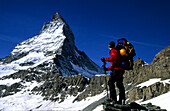 Climber ascending to Hoernli hut, Matterhorn 4478m, , Zermatt, Switzerland