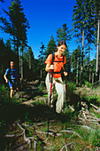 Couple of hikers on hiking trail, Boehmerwald, Muehlviertel, Upper Austria