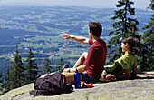 Hikers having wide view over Muehlviertel, Muehlviertel, Upper Austria