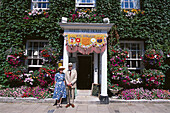 Couple and White Vine House, Rye, East Sussex England