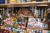 Woman at Kiosk, Plaka, the oldest historical area of Athens, Central Market,  Athens, Greece