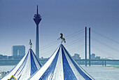 Two tents in front of the skyline of Duesseldorf, North Rhine-Westphalia, Germany