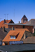 Roofs and a sign for fish selling, Mecklenburg Lake District, Mecklenburg-Western Pomerania, Germany