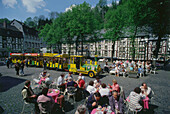 Tourists on marketplace in Monschau, Eifel, North Rhine-Westphalia, Germany