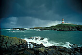 Lighthouse and stormy sea, Boddam Village, Grampian mountains, Scotland, Great Britain