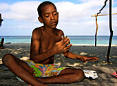 Boy playing on the Beach, Carribbean Beach, Cartagena, Colombia, South America
