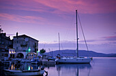 Boats in harbor in twilight, Valun, Cres island, Kvarner Gulf, Croatia
