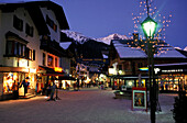 Illuminated pedestrian area in the evening, St. Anton, Tyrol, Austria