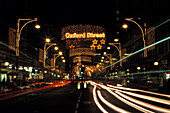 Weihnachtsbeleuchtung in der Oxford Street am Abend, London, England, Grossbritannien, Europa