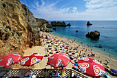 Sunshades and sandy beach, Praia do Dona Ana, Lagos, Algarve, Portugal, Europe