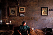 Man sitting in restaurant U Kalicha, Prague, Czech Republic