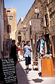 People in front of souvenir shops at the citadel, Victoria Rabat, Gozo Island, Malta, Europe