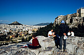 People at Areopags Hill, Acropolis Athens, Greece