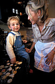 Woman and Child are baking, Cookies