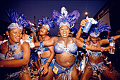 Women in costumes dancing at Mardi Gras, Port of Spain, Trinidad and Tobago, Caribbean