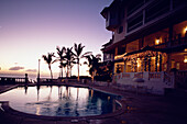 Pool at Hotel Gran Bahla in the evening light in Samana, Samana Peninsula, Dominican Republic, Caribbean