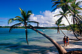 Couple, Beach, Palm Trees, Playa Bonito in Las Terrenas, Dominican Republic