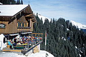 People in front of a ski hut, Melkalm, Kitzbuehel, Tyrol Austria, Europe