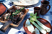 Porcheddu, Restaurant Su Meriacru, Spaggia Berchida, Baronie Sardinien, Italien