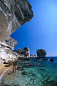 Two women at the bech, Plage de Sutta Rocca, beach, cliffs of Bonifacio, Corsica, France