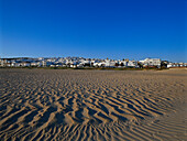 Deserted beach under blue sky, Playa de los Bateles, Conil, Costa de la Luz, Cadiz province, Andalusia, Spain, Europe