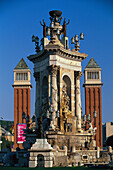 Venetian towers and statue, Fuente de los Tres Tares, Placa de Espanya, Barcelona, Catalonia, Spain