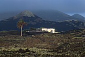 House in volcanic landscape, Montanas del Fuego, Lanzarote Canary Isl., Spain