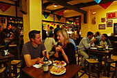 Couple in the Montaditos Bar, Lizarran, Palma de Mallorca, Mallorca, Spain