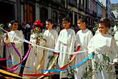 Children at the Palm sunday-Prozession through the old town, Las Palmas, Gran Canaria, Canary Islands, Spain