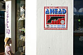 Child looking in a souvenir shop window, warning sign, Jeffreys Bay, Eastern Cape, South Africa, Africa