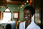 Waitress in a restaurant, Clock Tower, Victoria and Albert Waterfront, Cape Town, Western Cape, South Africa