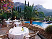 Terrace and swimming pool in Hotel La Residencia, Deyá, Majorca, Spain