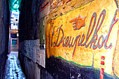 Dark alley with sign, ghent, belgium