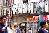 People in front of a fashion store, Shanghai, China, Asia