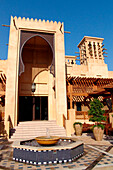 Fountain in front of arabian building with wind tower, Madinat Jumeirah, Dubai, UAE, United Arab Emirates, Middle East, Asia