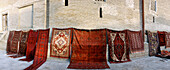 Carpet sale in street, Bukhara, Silk Road, Uzbekistan