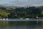 Akaroa Harbour, boats, NZ, Boats in Akaroa harbour, Banks Peninsula, Akaroa is NZ's pseudo French settlement, popular day trip from Christchurch, an extinct volcano with many bays, beaches, and hill views