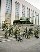 Soldiers climbing stairs in front of the Central Armed Forces Museum, Moscow, Russia