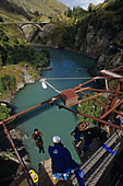 People Bungee jumping above Kawarau River, Otago, South Island, New Zealand, Oceania