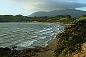 Beach, bay, Coromandel Peninsula, evening sun, Mt Moehau, North Island, New Zealand, Coromandel Halbinsel