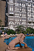 Stone figures at the pool of the Taj Mahal hotel, Bombay, India, Asia