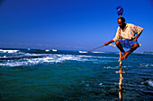 Stilt fisherman with fishing rod, Sri Lanka, Asia