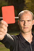Referee showing red card