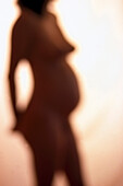 Naked pregnant woman