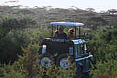 Safari Jeep with Tourists, Safari, Serengeti National Park, Tanzania, Africa