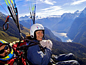 Paragliding, tandem-flight, woman, pilot, Koenigsse, Gleitschirmflug, Tandemflug, Koenigssee, Berchtesgaden, Oberbayern, Deutschland Paragliding, Upper Bavaria, Germany
