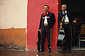 Two Mariachi musicians with their instruments, Mexico. Central America