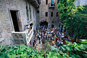 Tourists looking at the balcony of Julia, Verona, Veneto, Italy, Europe